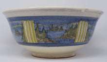 Load image into Gallery viewer, Side view of Handmade and hand painted Ceramic Slipware Serving Bowl 32 cm x 32 cm x 14 cm With exterior panel paintings of a Canadian Landscapes, Northern Lake scenes with Blue banding green stripes decoration. by Sean Robinson Ceramics
